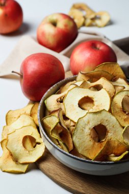 Concept of tasty food, dried apple chips