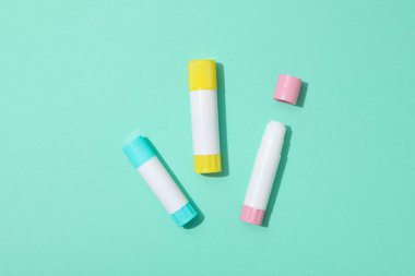 Concept of different office stationery with glue