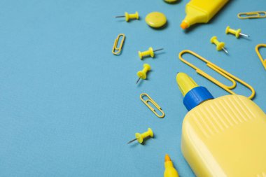 Concept of different office stationery with glue