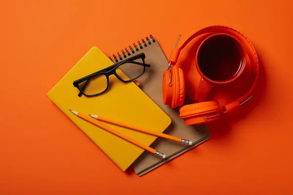 stock image Concept of freelance, composition with hot drink and headphones