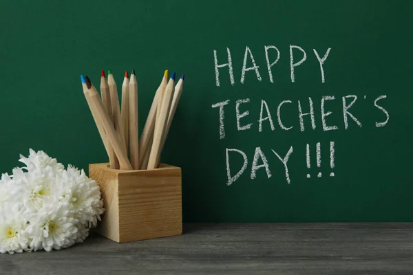 Stock image Happy teacher's day greetings, inscription on a green board