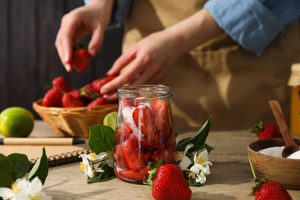 Concept of cooking tasty and sweet food - strawberry jam