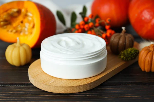Skin care and face care concept - pumpkin cosmetic
