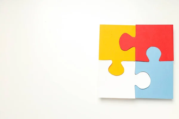 Cztery Puzzle Białym Tle Miejsce Tekst Światowy Dzień Autyzmu — Zdjęcie stockowe