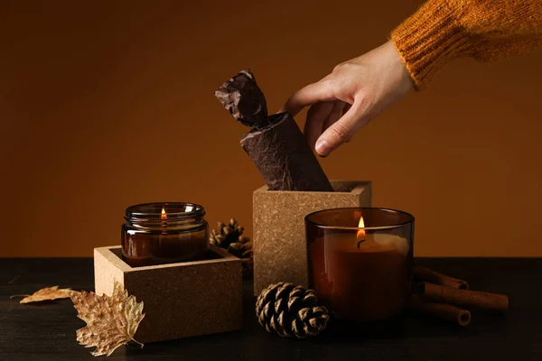 Candles Cones Female Hand Brown Background — Stock Photo, Image