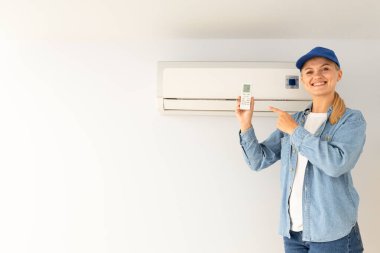 Kadın üstat ve klima, klima tamiri.