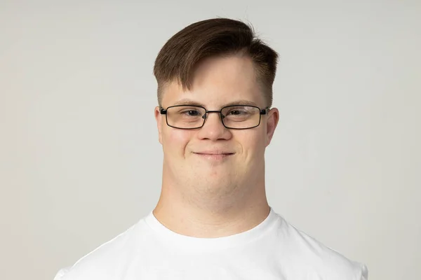 Smiling Young Man Cerebral Palsy Glasses White Shirt Poses Camera — Stock Photo, Image