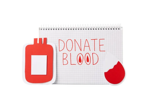 Png Ένα Χάρτινο Δοχείο Αίματος Ένα Σημειωματάριο Δωρεά Αίματος Απομονωμένη — Φωτογραφία Αρχείου