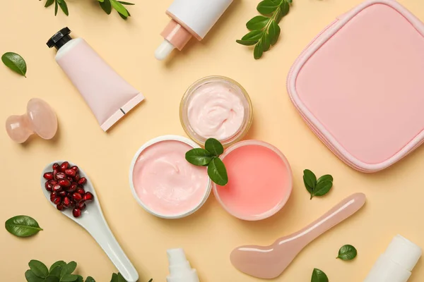 Self care and skincare products concept - pomegranate cosmetics