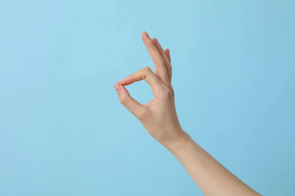 Female Hand Shows Gesture Hand Sign — Stock Photo, Image