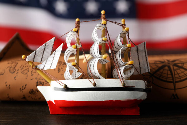 Columbus Day. The ship on the background of the American flag