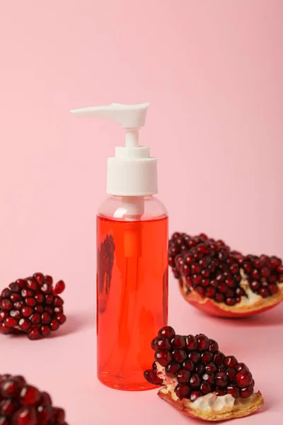 Self care and skincare products concept - pomegranate cosmetics