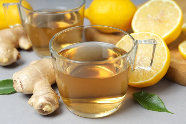 Cups Tea Ginger Lemons Gray Background Close — Stock Photo, Image