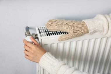 Heating season concept, providing heat in the house clipart