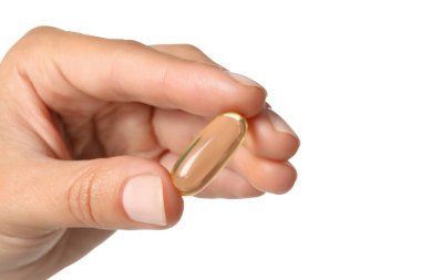 PNG, ellerinde Omega hapları, beyaz arka planda izole edilmiş.