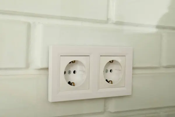 stock image Electric white sockets on a white wall