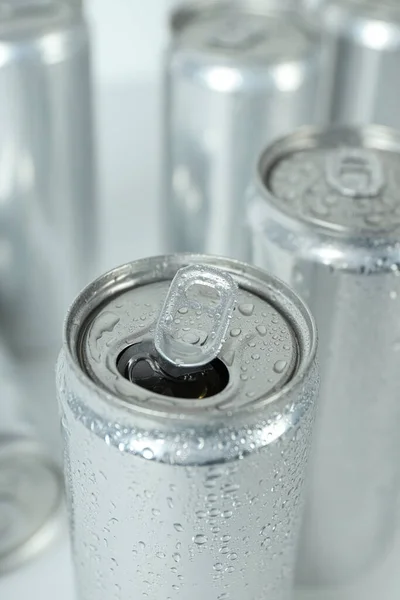 Tin cans for drinks on a white background