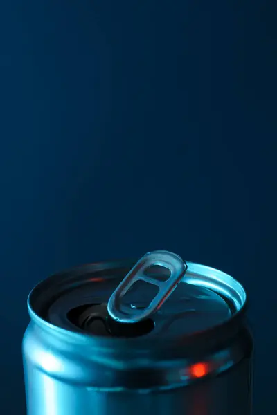 Tin can for drinks on a blue background