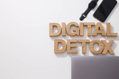 Digital detox concept, gadgets on the table clipart