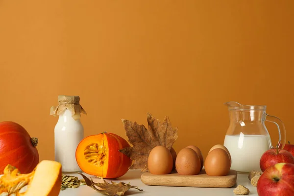 Eggs, milk and pumpkin, autumn baking concept.