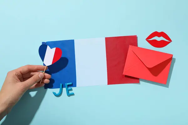 Flag of France and other symbols on a blue background.