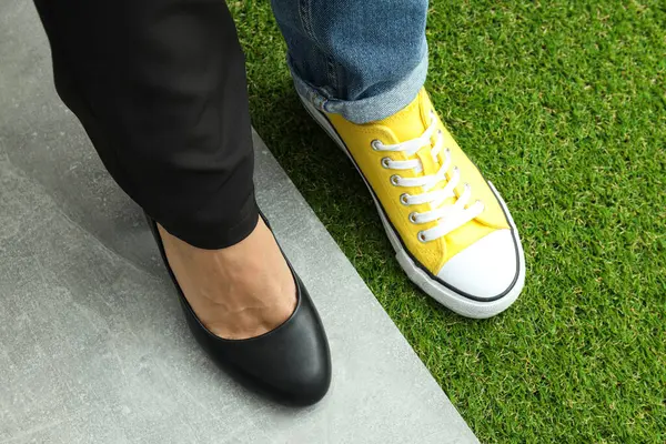 The concept of work-life balance, casual and office footwear.