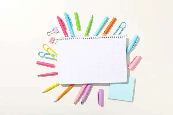 stock image Notebook and stationery on the table, top view.