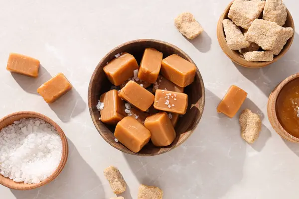Cubes of salted caramel in a wooden bowl