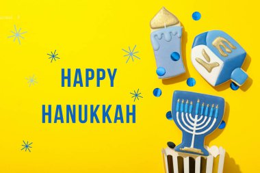 Hanukkah, festive attributes on a yellow background, created using Generative AI technology. clipart