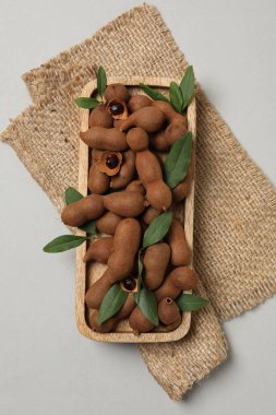 Tamarind fruit, concept of delicious food, fresh tamarind clipart