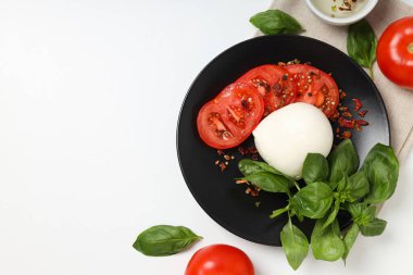 Salata Caprese, lezzetli ve lezzetli yemek kavramı.