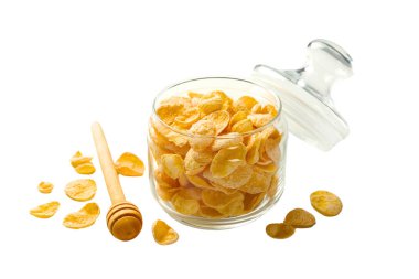 Ballı mısır gevreği kavanozu, beyaz arka planda izole edilmiş.