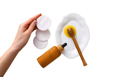 Hand with cotton pads, honey, egg, isolated on white, PNG