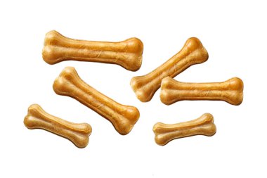 Köpek maması, evcil hayvanlar için şenlikli kemiklere benzer. Beyazlar üzerinde izole edilmiş, PNG