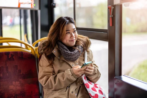 Young Woman Traveling Bus Using Smart Phone — Stock Photo, Image