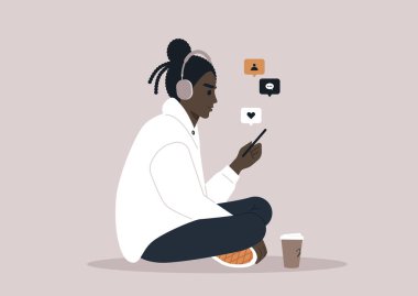 Genç bir Afrikalı kambur karakter telefonlarında haber yayını yapıyor.