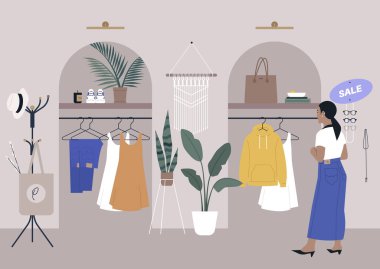 Moda mağazası, organik malzemeler, aksesuarlar, el yapımı dekor, etrafta dolaşan bir müşteri.