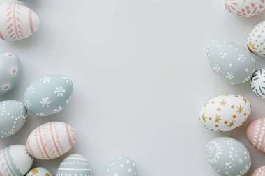 Artfully arranged Easter eggs on a dual-tone pastel background clipart