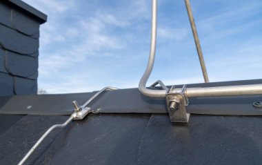 roof with metal lightning arrester or protection