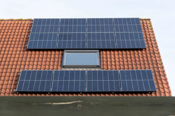 solar panels on a red tiled roof