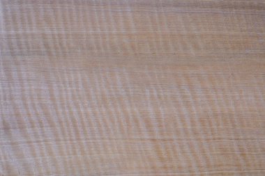 Maple wood has tiger stripe or curly stripe grain