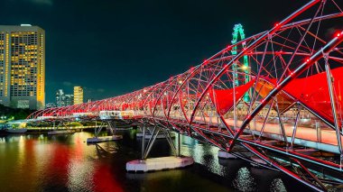 Singapur 8 Nisan 2025. Marina Bay Sands ile Singapur 'un ufuk çizgisi, Merlion finans bölgesi. Singapur, Malezya 'nın güneyinde bir ada-şehir devleti..