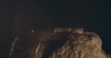 Water Drips Off Stalactite Into Pool On Top Of the Stalagmite