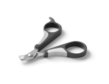 Tool for clipping claws of animals on a white background. Scissors for cutting claws for pets on isolation. Hygiene for cats and dogs. Animal foot care.