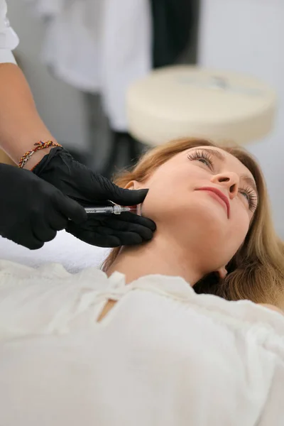 Face treatments. The concept of maintaining health, youth and beauty. Modern cosmetology, beautician tools. Beauty techniques. Facial mesotherapy. Beauty injections. Botulinum therapy of the face.