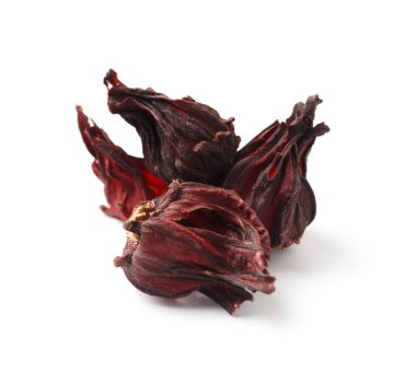 Hibiscus tea on a white background close-up. Dry flowers of red hibiscus on isolation. A handful of hibiscus for making tea. Ingredients for preparing a healthy drink.