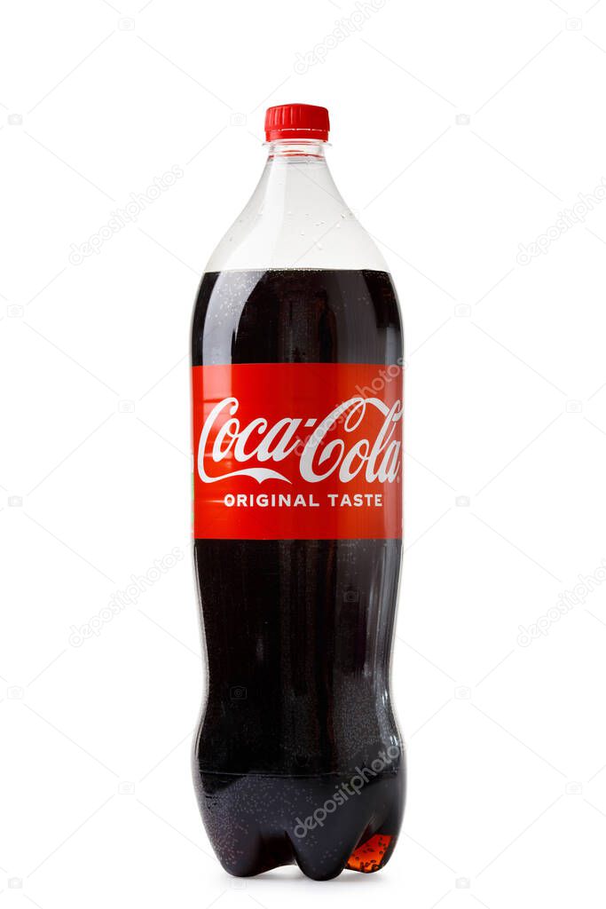 Nikolaev, Ukraine, July 30, 2023. Large plastic bottle of the most popular carbonated drink Coca-Cola isolated on white background.