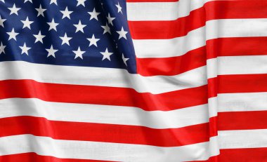 Rüzgarda dalgalanan yıldız çizgili bir Amerikan bayrağı. Amerikan halkının gururu. ABD 'de bağımsızlık ve vatanseverliğin sembolü.