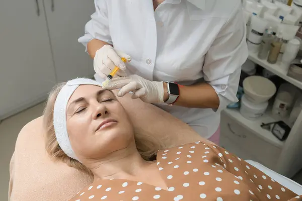 Face treatments. The concept of maintaining health, youth and beauty. Modern cosmetology, beautician tools. Beauty techniques. Facial mesotherapy. Beauty injections. Botulinum therapy of the face.