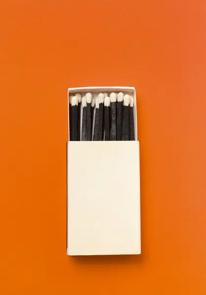 Black Matches Box Orange Background — Stock Photo, Image